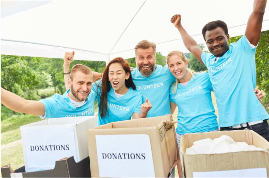 People collecting donations in boxes