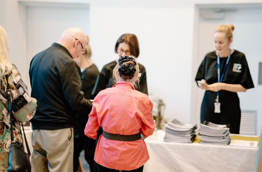 Attendees purchasing tickets for the 2023 Hunters Hill Art Exhibition at the Hunters Hill Town Hall