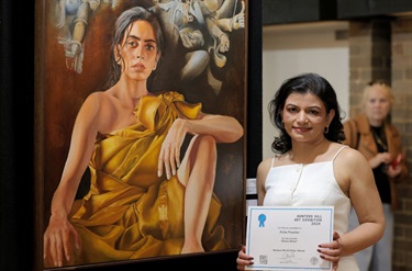 Richa-Panicker-winner-of-Hunters-Hill-Art-Prize-beside-her-artwork