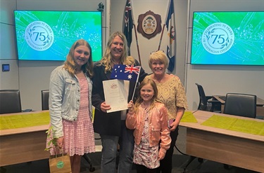 New citizen pictured with her family after the ceremony