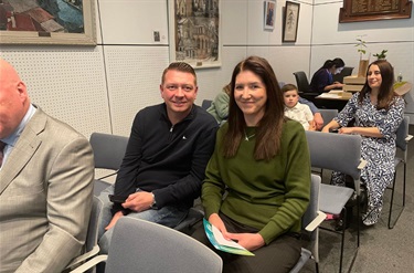 New citizen sitting in the Council Chambers